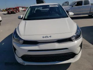 2023 Kia Rio S with VIN 3KPA24AD2PE579419, listed as a Copart auction lot 73399664 with 47,857 mi miles and Salvage Title. Bid and sale history available at DreamBid. Image 5.