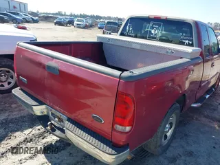 2000 Ford F-150 XL with VIN 1FTZX1725YNA94343, listed as a IAAI auction lot 41659358 with 295,337 mi miles. Bid and sale history available at carsss.com. Image 4.