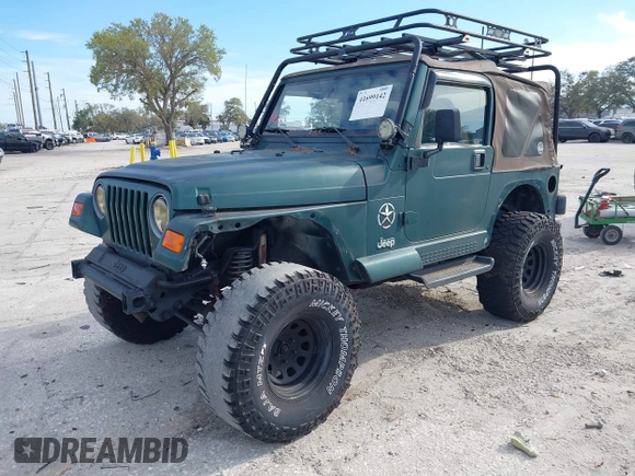 2000 Jeep Wrangler Sahara with VIN 1J4FA59SXYP743190, listed as a IAAI auction lot 41699142 with 1 mi miles. Bid and sale history available at carsss.com. Image 2.