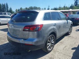 2014 Mazda CX-9 Grand Touring with VIN JM3TB2DA9E0435295, listed as a IAAI auction lot 42618683 with 177,783 mi miles and . Bid and sale history available at DreamBid. Image 4.