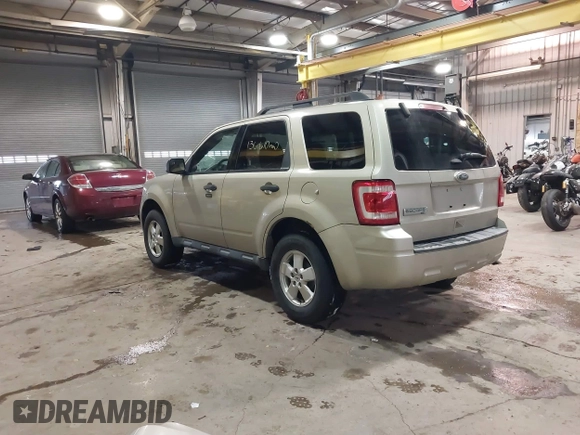 2011 Ford Escape XLT with VIN 1FMCU0D75BKB11168, listed as a IAAI auction lot 41327470 with 136,610 mi miles. Bid and sale history available at carsss.com. Image 3.