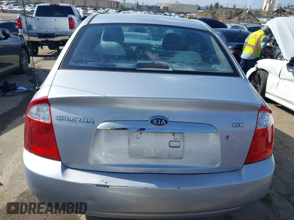 2005 Kia Spectra LX with VIN KNAFE122355139496, listed as a IAAI auction lot 41955660 with 58,676 mi miles. Bid and sale history available at carsss.com. Image 17.