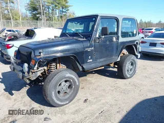 2001 Jeep Wrangler Sport with VIN 1J4FA49S61P357348, listed as a IAAI auction lot 41938170 with 177,356 mi miles. Bid and sale history available at carsss.com. Image 2.