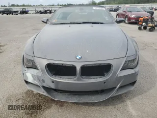 2007 BMW 6 Series M6 z VIN WBSEK93557CY78648, wystawiony jako Copart lot #52179345 z przebiegiem 22 453 mil mil oraz Szkoda całkowita • Salvage title. Historia ofert i sprzedaży dostępna na DreamBid. Obrazek 5.