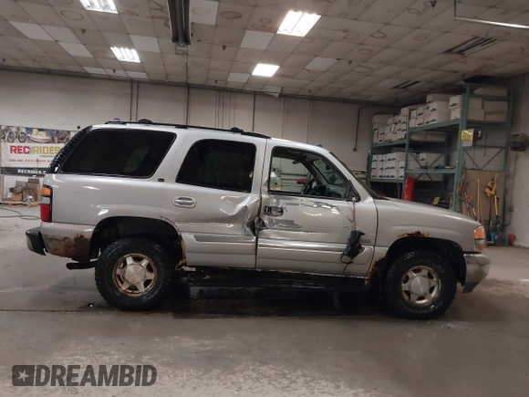 2004 GMC Yukon SLT with VIN 1GKEK13TX4J155865, listed as a IAAI auction lot 41758663 with 281,531 mi miles. Bid and sale history available at carsss.com. Image 13.