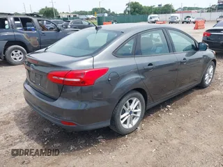 2016 Ford Focus SE with VIN 1FADP3F21GL387227, listed as a IAAI auction lot 42438650 with 59,969 mi miles and . Bid and sale history available at DreamBid. Image 4.