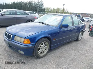 1998 BMW 3 Series 328iA with VIN WBACD4325WAV64684, listed as a IAAI auction lot 42032472 with 240,264 mi miles. Bid and sale history available at carsss.com. Image 2.