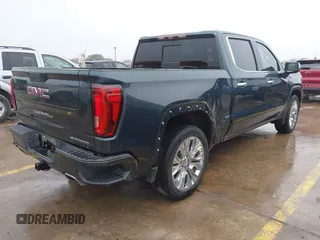 2020 GMC Sierra 1500 Denali z VIN 1GTU9FEL1LZ120581, wystawiony jako IAAI lot #41428827 z przebiegiem 97 917 mil mil oraz . Historia ofert i sprzedaży dostępna na DreamBid. Obrazek 4.