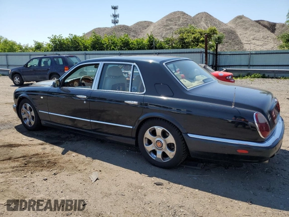 2001 Bentley Arnage with VIN SCBLC31E31CX05992, listed as a Copart auction lot 60462974 with 253,028 mi miles and Salvage Title. Bid and sale history available at DreamBid. Image 2.