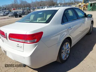 2012 Lincoln MKZ with VIN 3LNHL2GC4CR802198, listed as a IAAI auction lot 41703450 with 107,397 mi miles. Bid and sale history available at carsss.com. Image 4.