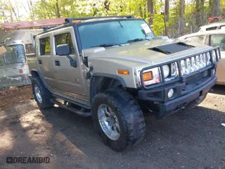 2005 Hummer H2 SUT with VIN 5GRGN22UX5H106653, listed as a IAAI auction lot 42015559 with 180,519 mi miles. Bid and sale history available at carsss.com. Image 1.
