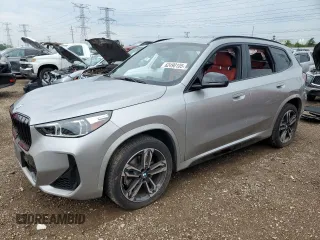2023 BMW X1 xDrive28i with VIN WBX73EF07P5X69766, listed as a Copart auction lot 62490105 with 9,193 mi miles and Salvage title. Bid and sale history available at DreamBid. Image 1.