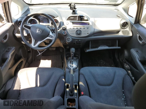 2011 Honda Fit Sport with VIN JHMGE8H57BC024827, listed as a Copart auction lot 59704194 with 146,316 mi miles and Salvage Title. Bid and sale history available at DreamBid. Image 8.