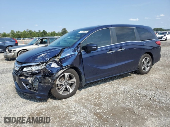 2020 Honda Odyssey Touring with VIN 5FNRL6H85LB003302, listed as a Copart auction lot 72709924 with 58,228 mi miles and Salvage Title. Bid and sale history available at DreamBid. Image 1.