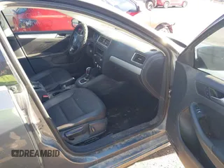 2013 Volkswagen Jetta SE with VIN 3VWDX7AJ1DM411050, listed as a IAAI auction lot 40888860 with 57,938 mi miles and . Bid and sale history available at DreamBid. Image 5.