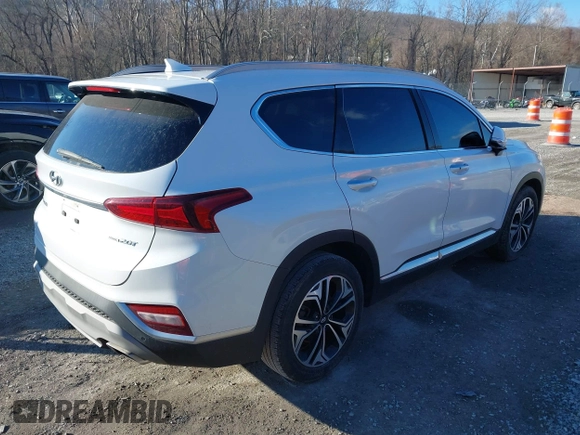 2019 Hyundai Santa Fe Ultimate with VIN 5NMS5CAA9KH012167, listed as a IAAI auction lot 41614279 with 100,925 mi miles and . Bid and sale history available at DreamBid. Image 4.