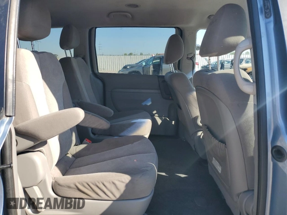 2012 Kia Sedona LX with VIN KNDMG4C70C6447748, listed as a Copart auction lot 71377294 with 146,057 mi miles and Salvage Title. Bid and sale history available at carsss.com. Image 12.