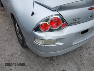 2005 Mitsubishi Eclipse GS with VIN 4A3AE45GX5E028351, listed as a IAAI auction lot 41605560 with 207,005 mi miles and . Bid and sale history available at DreamBid. Image 6.