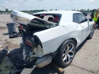2015 Dodge Challenger SXT Plus with VIN 2C3CDZBG4FH905009, listed as a IAAI auction lot 42396473 with 197,459 mi miles and . Bid and sale history available at DreamBid. Image 4.