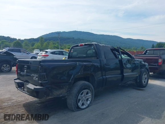 2011 Ram Dakota Bighorn/Lonestar with VIN 1D7RW3GK0BS559706, listed as a IAAI auction lot 39803105 with 90,663 mi miles. Bid and sale history available at carsss.com. Image 4.