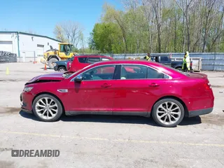 2014 Ford Taurus Limited z VIN 1FAHP2F87EG131051, wystawiony jako IAAI lot #42197519 z przebiegiem 110 715 mil mil oraz . Historia ofert i sprzedaży dostępna na DreamBid. Obrazek 14.