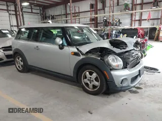 2011 MINI Clubman with VIN WMWZF3C56BT188312, listed as a IAAI auction lot 41980882 with 143,669 mi miles and . Bid and sale history available at DreamBid. Image 1.