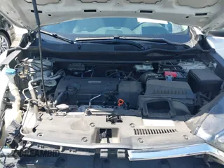 2019 Honda CR-V LX with VIN 2HKRW5H33KH407463, listed as a IAAI auction lot 42034584 with 85,454 mi miles and . Bid and sale history available at DreamBid. Image 10.