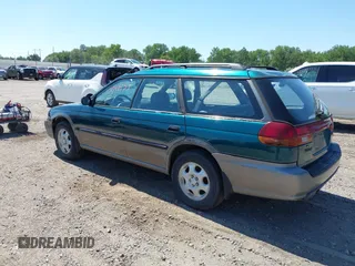 1996 Subaru Legacy Outback z VIN 4S3BG6854T7980058, wystawiony jako IAAI lot #42641853 z przebiegiem 291 685 mil mil oraz . Historia ofert i sprzedaży dostępna na DreamBid. Obrazek 3.