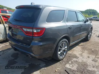 2019 Dodge Durango R/T with VIN 1C4SDJCTXKC740858, listed as a IAAI auction lot 42380318 with 99,060 mi miles and . Bid and sale history available at DreamBid. Image 4.