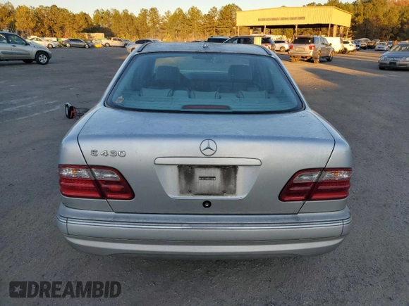 2000 Mercedes-Benz E-Class with VIN WDBJF70JXYB113988, listed as a Copart auction lot 86325514 with 198,321 mi miles and Salvage Title. Bid and sale history available at carsss.com. Image 6.