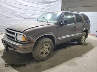 1997 Chevrolet Blazer LS z VIN 1GNDT13WXV2156113, wystawiony jako Copart lot #57405055 z przebiegiem 203 821 mil mil oraz Czysty tytuł • Clean title. Historia ofert i sprzedaży dostępna na DreamBid. Obrazek 1.
