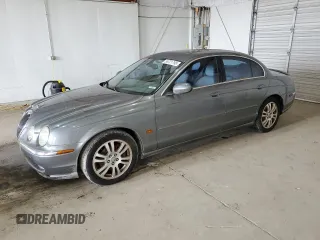 2003 Jaguar S-Type z VIN SAJEA01U93HM88490, wystawiony jako Copart lot #55721795 z przebiegiem 192 773 mil mil oraz Tytuł czysty. Historia ofert i sprzedaży dostępna na DreamBid. Obrazek 1.
