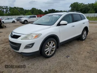 2012 Mazda CX-9 Grand Touring z VIN JM3TB2DA7C0358374, wystawiony jako Copart lot #58741885 z przebiegiem 127 162 mil mil oraz Czysty tytuł • Clean title. Historia ofert i sprzedaży dostępna na DreamBid. Obrazek 1.