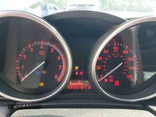 2011 Mazda 3 S Grand Touring z VIN JM1BL1M55B1391025, wystawiony jako Copart lot #57211885 z przebiegiem 199 326 mil mil oraz Szkoda całkowita • Salvage title. Historia ofert i sprzedaży dostępna na DreamBid. Obrazek 9.
