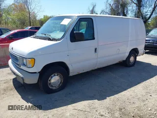 1999 Ford Econoline Cargo with VIN 1FTRE1421XHB21609, listed as a IAAI auction lot 42070347 with 103,104 mi miles. Bid and sale history available at carsss.com. Image 2.
