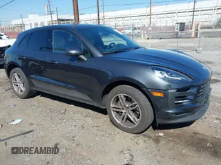 2021 Porsche Macan with VIN WP1AA2A58MLB04780, listed as a IAAI auction lot 41674377 with 55,946 mi miles and . Bid and sale history available at DreamBid. Image 1.