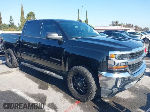 2017 Chevrolet Silverado 1500 LT with VIN 3GCPCREC5HG471758, listed as a IAAI auction lot 41991708 with 77,056 mi miles. Bid and sale history available at carsss.com. Image 1.