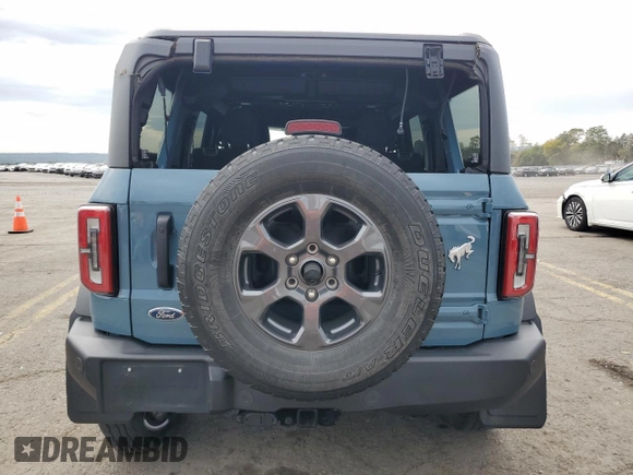 2021 Ford Bronco z VIN 1FMEE5BP8MLA68271, wystawiony jako Copart lot #72126884 z przebiegiem 36 942 mil mil oraz Szkoda całkowita • Salvage title. Historia ofert i sprzedaży dostępna na DreamBid. Obrazek 6.