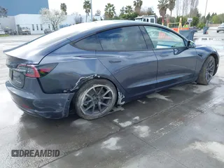 2022 Tesla Model 3 Long Range with VIN 5YJ3E1EB0NF259904, listed as a IAAI auction lot 41826642 with 42,272 mi miles and . Bid and sale history available at DreamBid. Image 4.