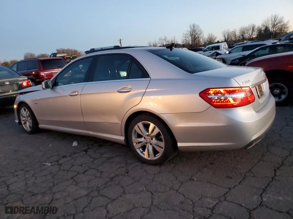 2011 Mercedes-Benz E-Class E 350 Luxury BlueTEC with VIN WDDHF2EB6BA306999, listed as a Copart auction lot 82699884 with 113,855 mi miles and Salvage Title. Bid and sale history available at carsss.com. Image 2.