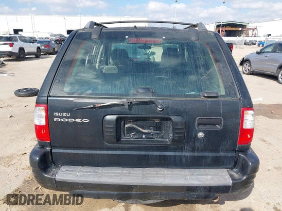 2001 Isuzu Rodeo S with VIN 4S2CK58W114363340, listed as a IAAI auction lot 41498698 with 185,408 mi miles and . Bid and sale history available at DreamBid. Image 16.