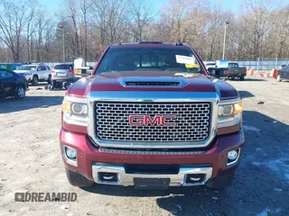 2017 GMC Sierra 2500HD Denali z VIN 1GT12UEY0HF186720, wystawiony jako IAAI lot #41580466 z przebiegiem Nie podano mil oraz . Historia ofert i sprzedaży dostępna na DreamBid. Obrazek 12.