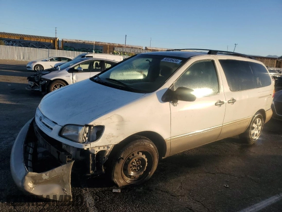 2000 Toyota Sienna LE with VIN 4T3ZF13CXYU184839, listed as a Copart auction lot 80035434 with 0 mi miles and Salvage Title. Bid and sale history available at carsss.com. Image 1.