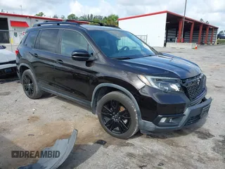 2019 Honda Passport Sport with VIN 5FNYF8H2XKB015924, listed as a IAAI auction lot 42441657 with 86,997 mi miles and . Bid and sale history available at DreamBid. Image 1.