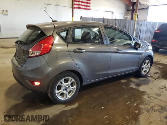 2014 Ford Fiesta SE with VIN 3FADP4EJ7EM232353, listed as a Copart auction lot 54680865 with 52,673 mi miles and Salvage Title. Bid and sale history available at DreamBid. Image 3.