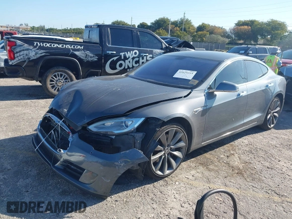 2014 Tesla Model S 60 with VIN 5YJSA1H1XEFP31911, listed as a IAAI auction lot 42029215 with Not Provided miles and . Bid and sale history available at DreamBid. Image 17.