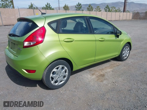 2011 Ford Fiesta SE with VIN 3FADP4EJ8BM157173, listed as a IAAI auction lot 41972892 with 407,227 mi miles. Bid and sale history available at carsss.com. Image 4.