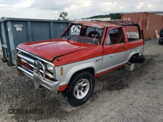 1987 Ford Bronco z VIN 1FMCU14T8HUC22622, wystawiony jako Copart lot #61193694 z przebiegiem 28 489 mil mil oraz Czysty tytuł • Clean title. Historia ofert i sprzedaży dostępna na DreamBid. Obrazek 1.
