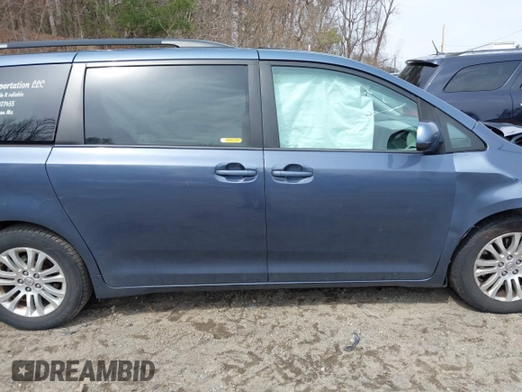 2014 Toyota Sienna XLE with VIN 5TDYK3DC9ES511035, listed as a IAAI auction lot 41884115 with 153,071 mi miles. Bid and sale history available at carsss.com. Image 14.