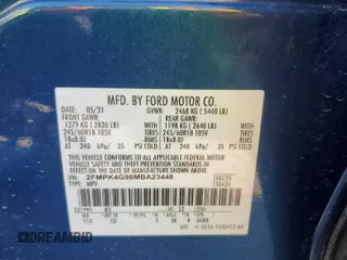 2021 Ford Edge SE z VIN 2FMPK4G98MBA23448, wystawiony jako Copart lot #51810435 z przebiegiem Nie podano mil oraz Szkoda całkowita • Salvage title. Historia ofert i sprzedaży dostępna na DreamBid. Obrazek 13.